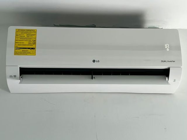 LG DUAL Inverter wall split installed in a bedroom